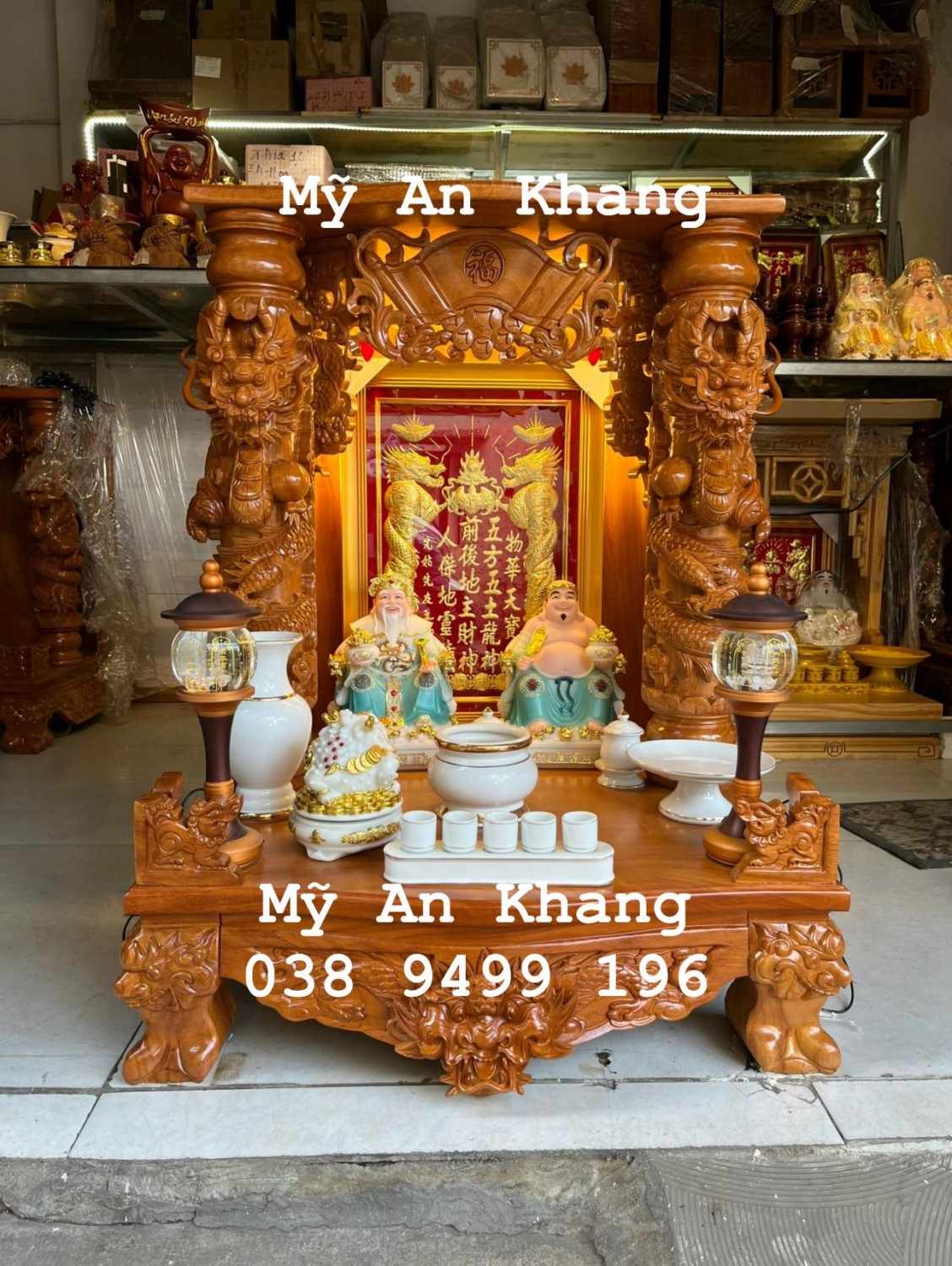 Bàn thờ thần tài đẹp mỹ an khang mái bằng 81 81 108 trụ 16 gỗ gõ đỏ